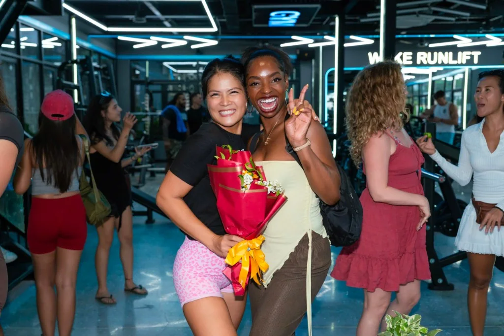 Members celebrating the opening of TamTay Fitness Center